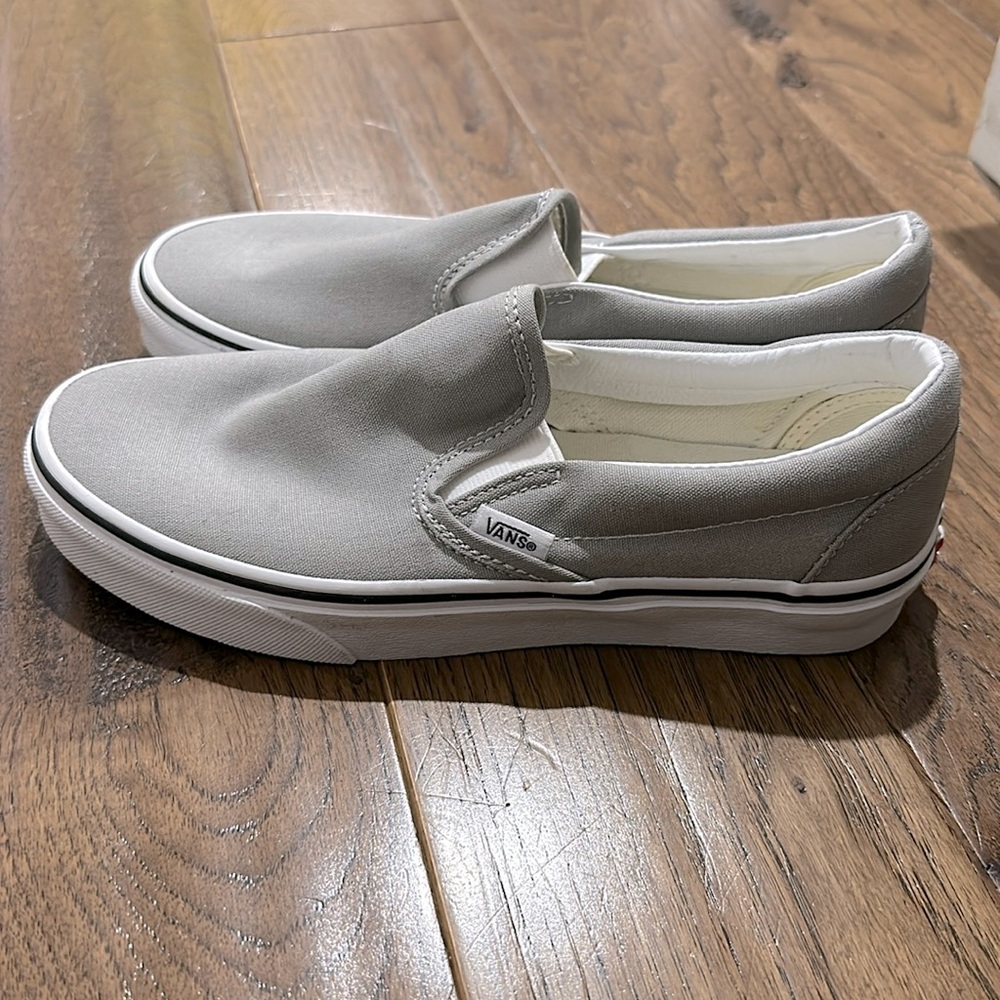 Never worn. Vans women’s slip ons